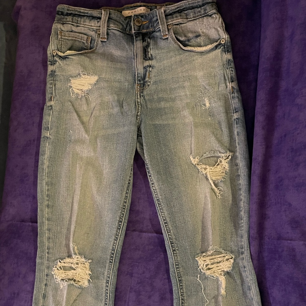 Skinny wash light distressed jeans